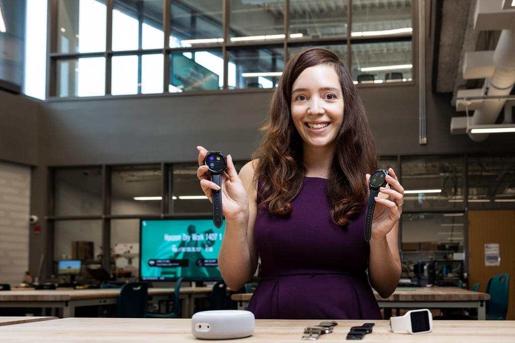 Mason researcher Vivian Motti holding wearable tech that she's hoping will help people live more independent lives.